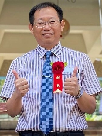 校長 簡文益